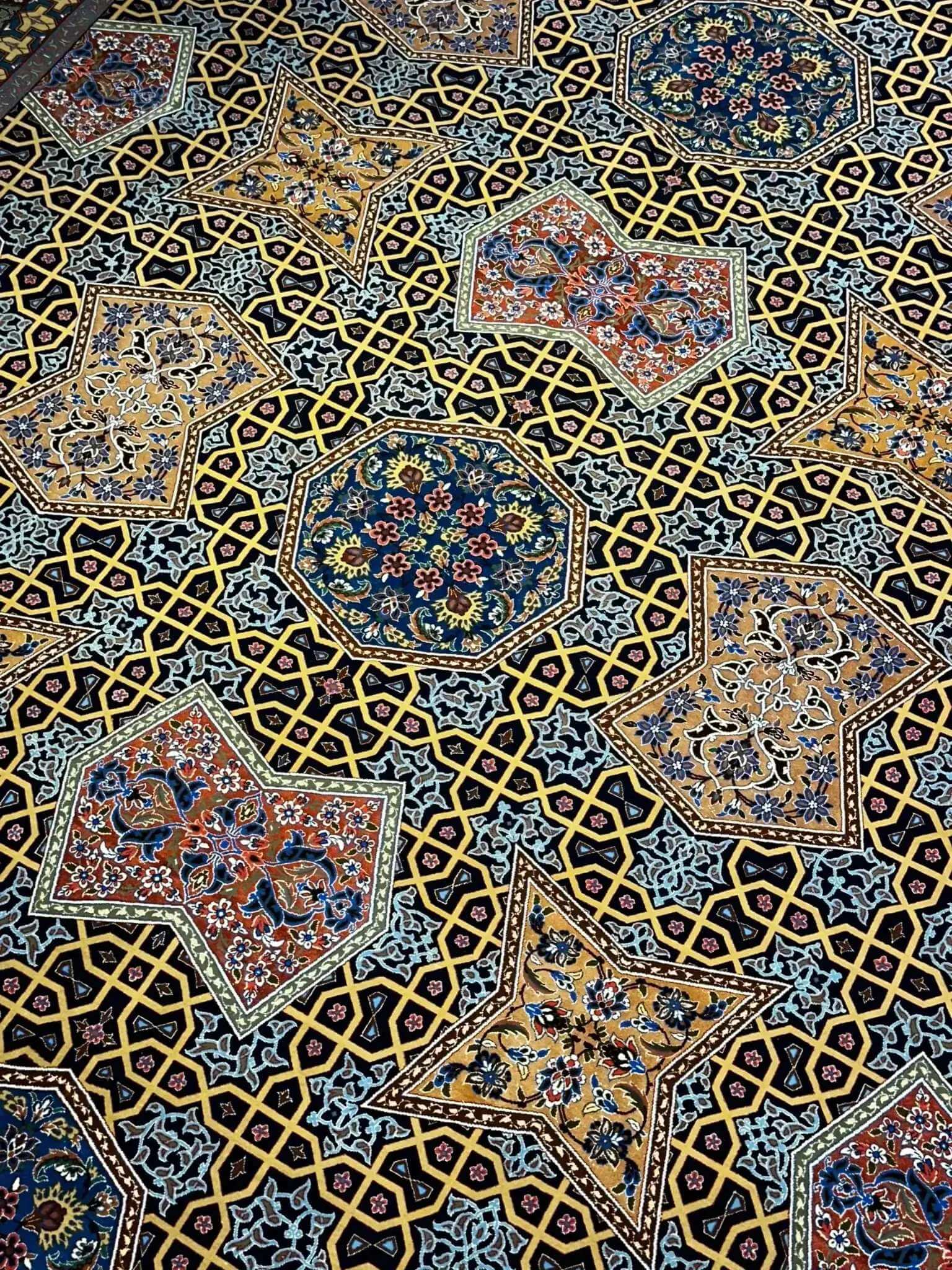 Stunning Isfahan Persian area rug, featuring a blend of wool and silk. With a size of 382x273 cm (12.5x9 feet) and a hand-knotted design, this unique rug showcases timeless elegance and a knot density of 870,000 per square meter